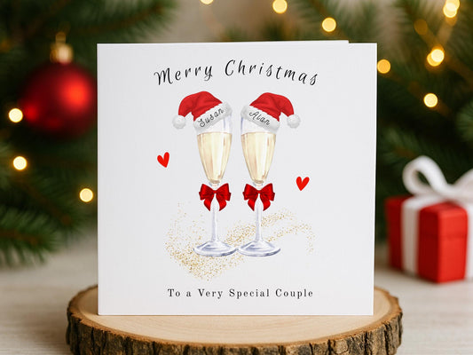 Personalised Champagne Christmas Card for Couple: Santa Hats